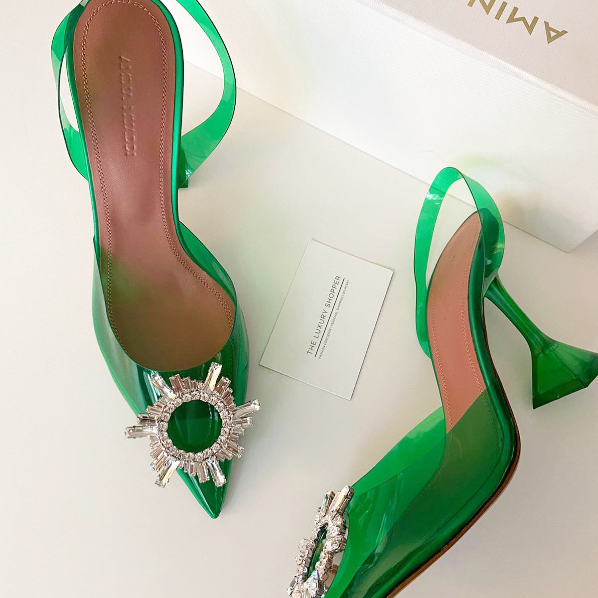 Amina Muaddi Begum Crystal Green PVC Slingback Pumps