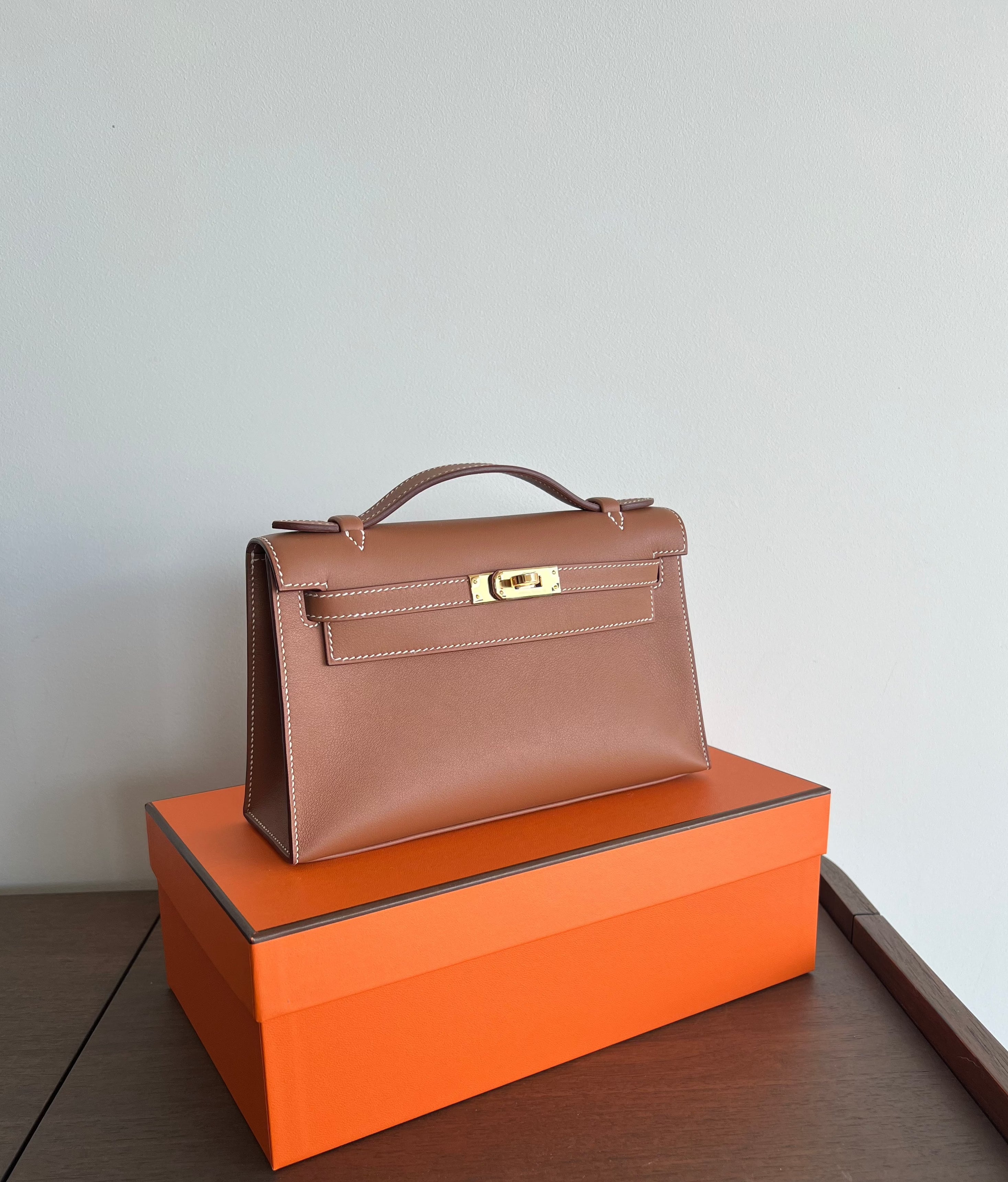 Hermes Kelly Pochette Gold Swift GHW