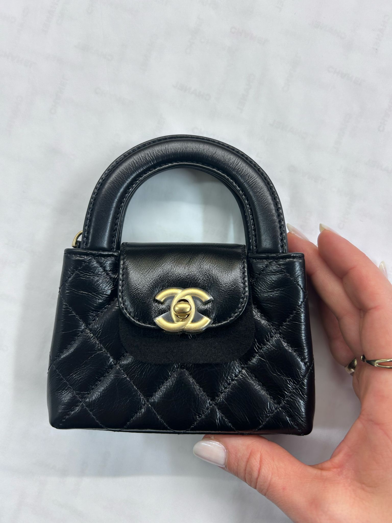 Chanel Kelly Shopping Bag Shiny Aged Calfskin & Gold Hardware Black (Nano)