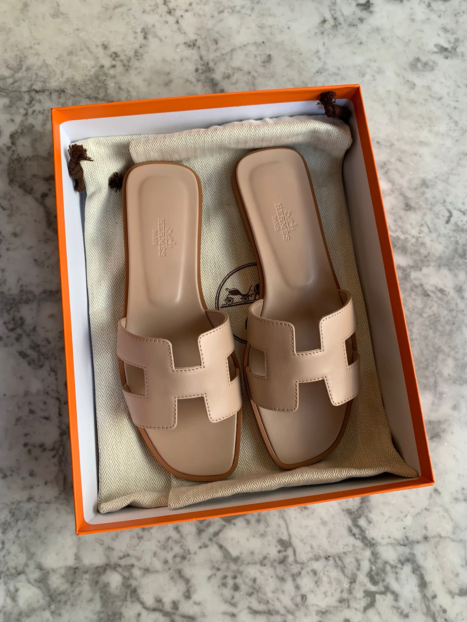 Hermès Oran Sandals (Beige Nude)