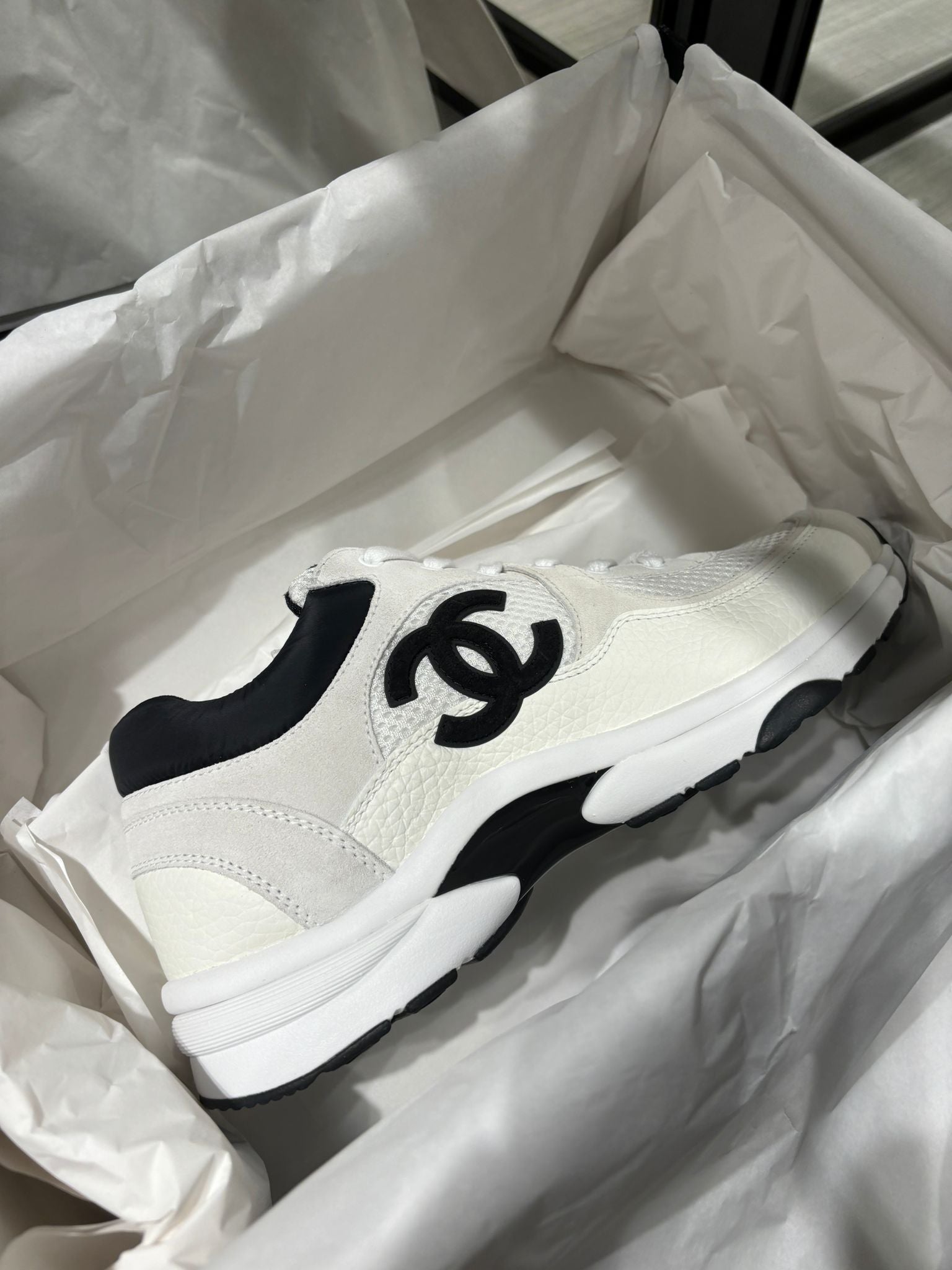 Chanel CC Logo Runner Sneaker White Black 2021