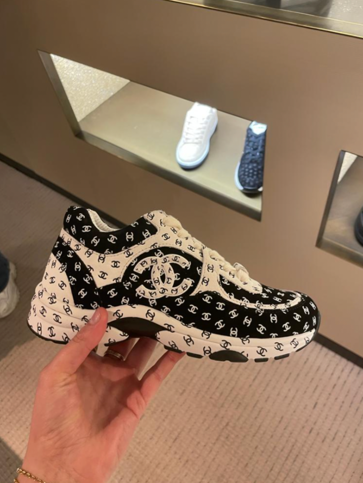 Chanel CC Logo Runner Sneaker Black/White 2022 - Main Image