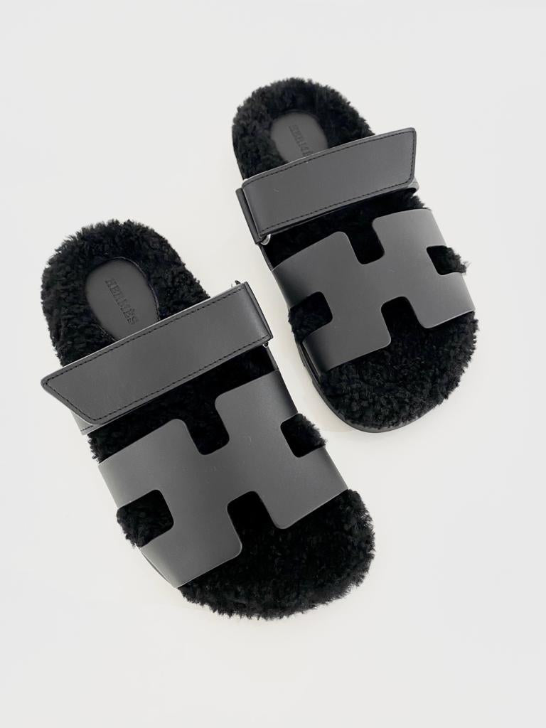 Hermès Chypre Shearling Sandals (Black) - Main Image